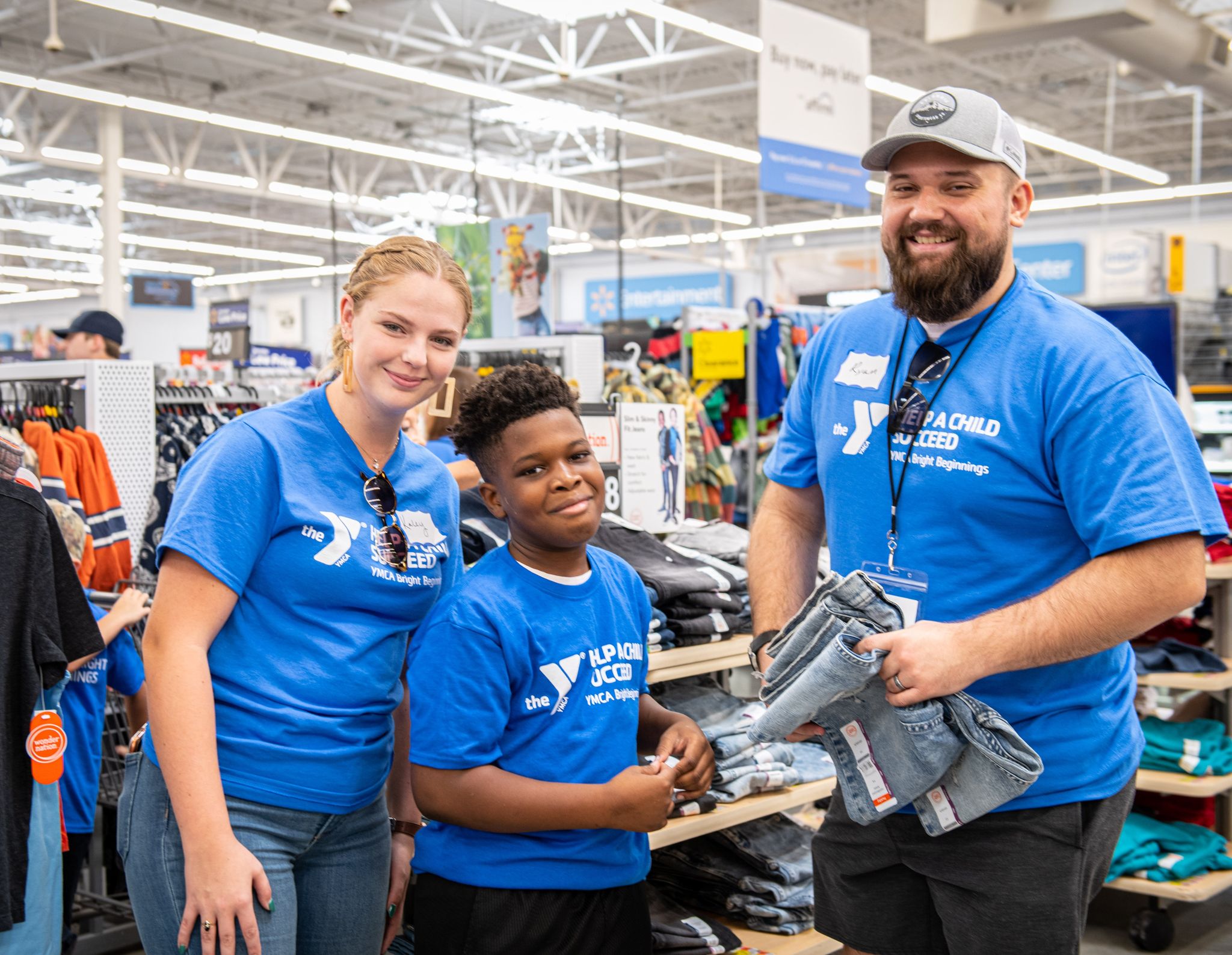 Two adults shopping with a child